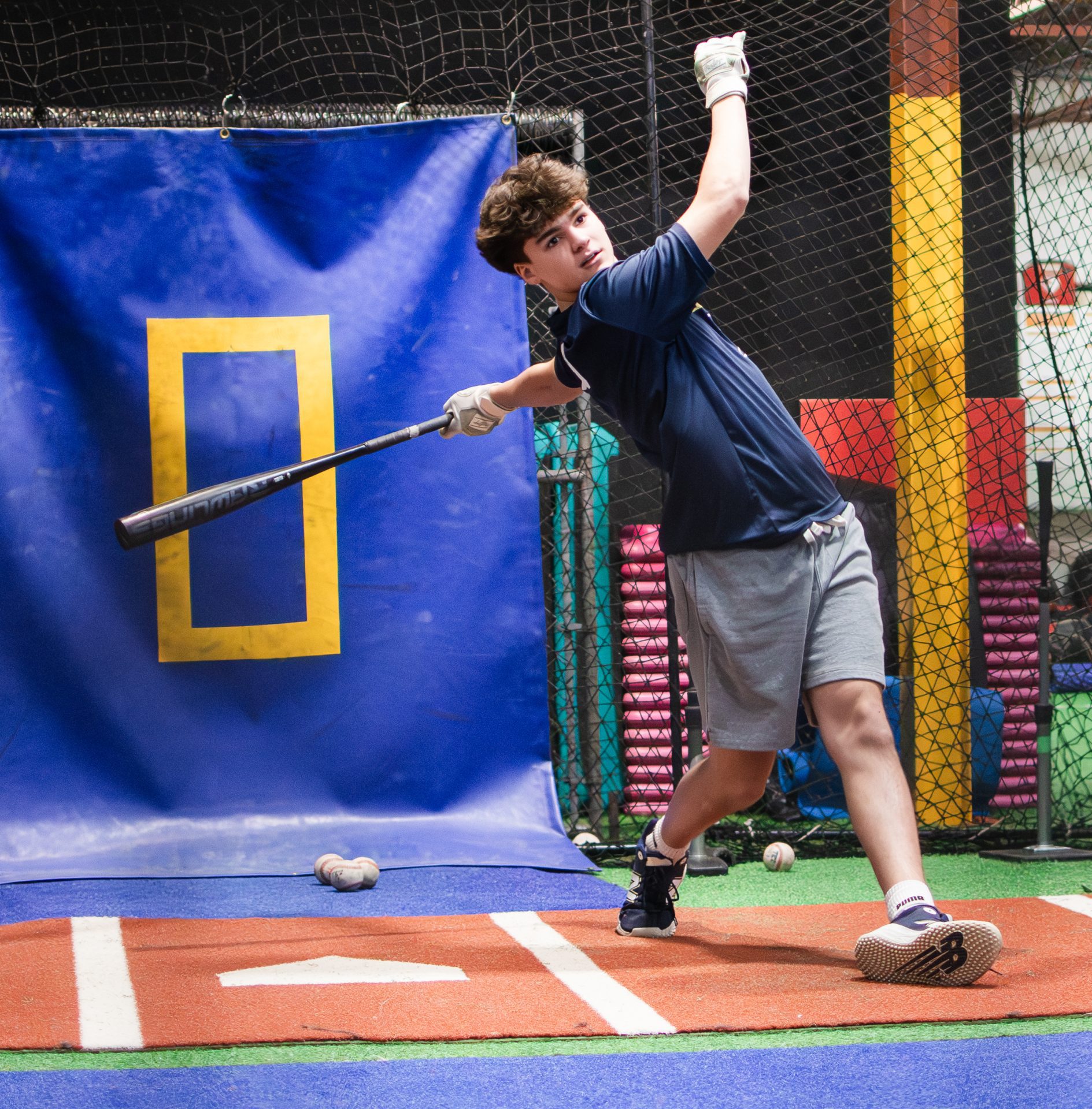 The-Baseball-Zone-kid-holding-baseball-bat